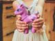 Hands purple child holding