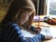 Child girl homework